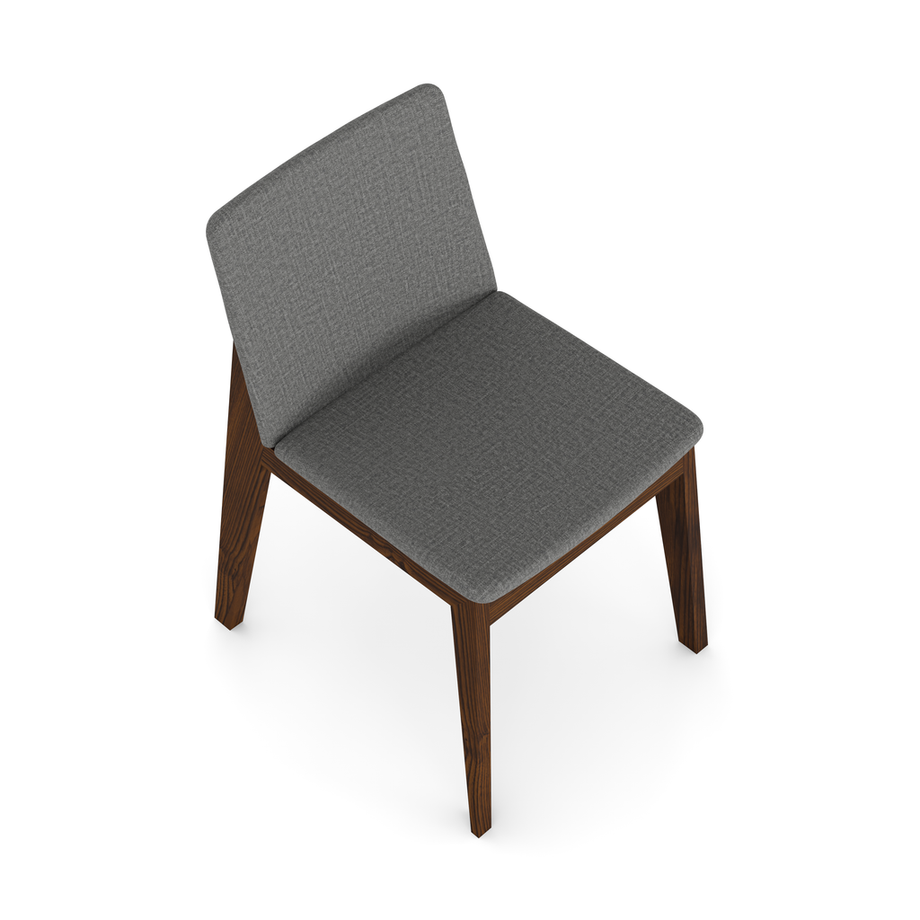 Close-up – walnut wood grain and beige upholstery detail