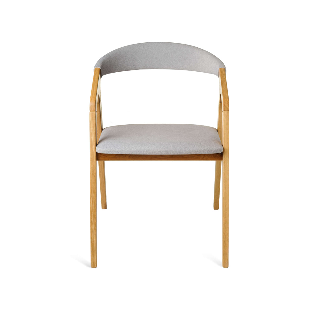 Olive Ash Bridge Chair front view showing soft grey fabric and light frame