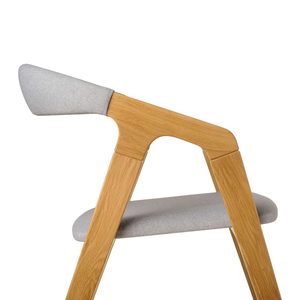 Close-up – Olive Ash grain texture and grey fabric upholstery