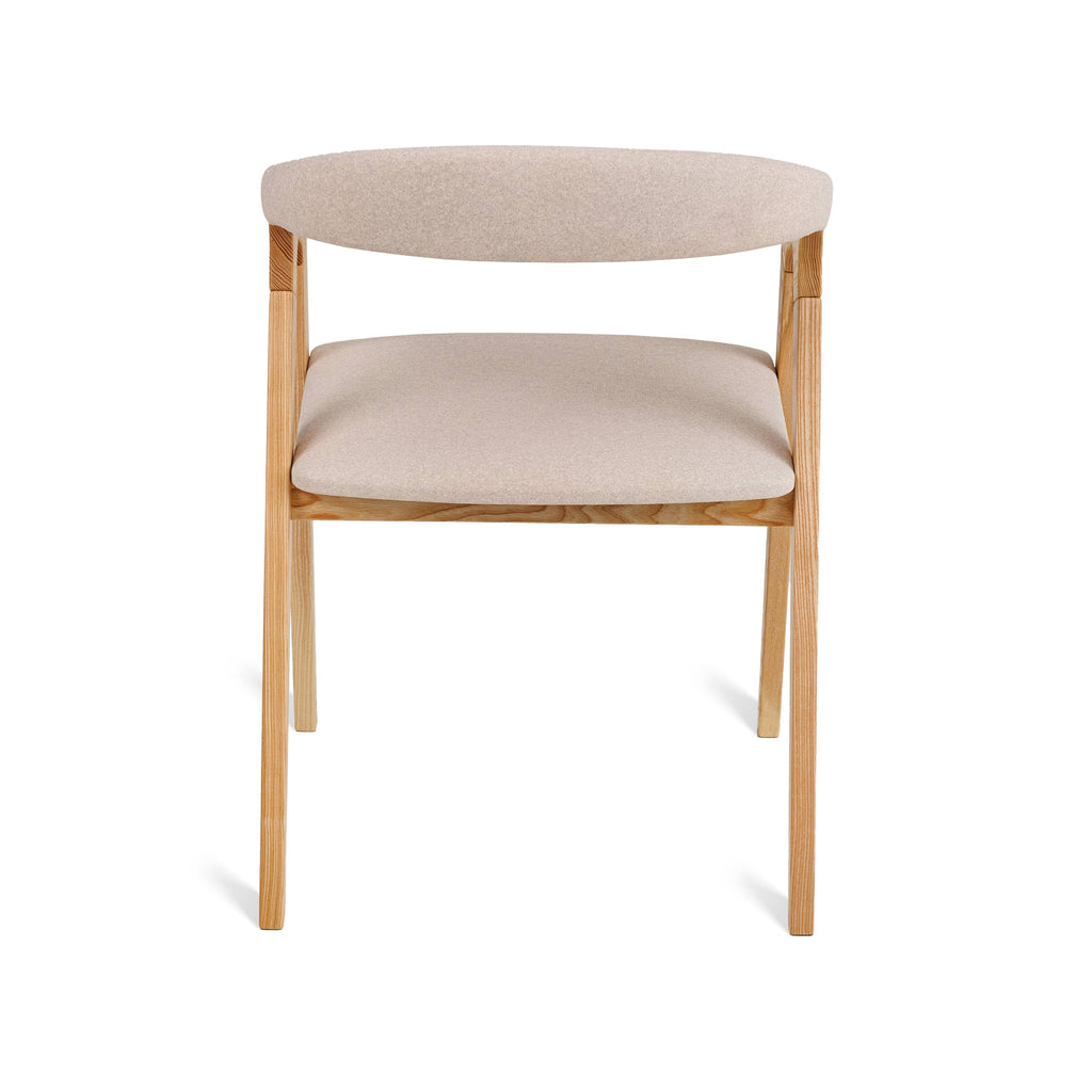 Rear angle of Olive Ash Bridge Chair showing curved back and beige seat