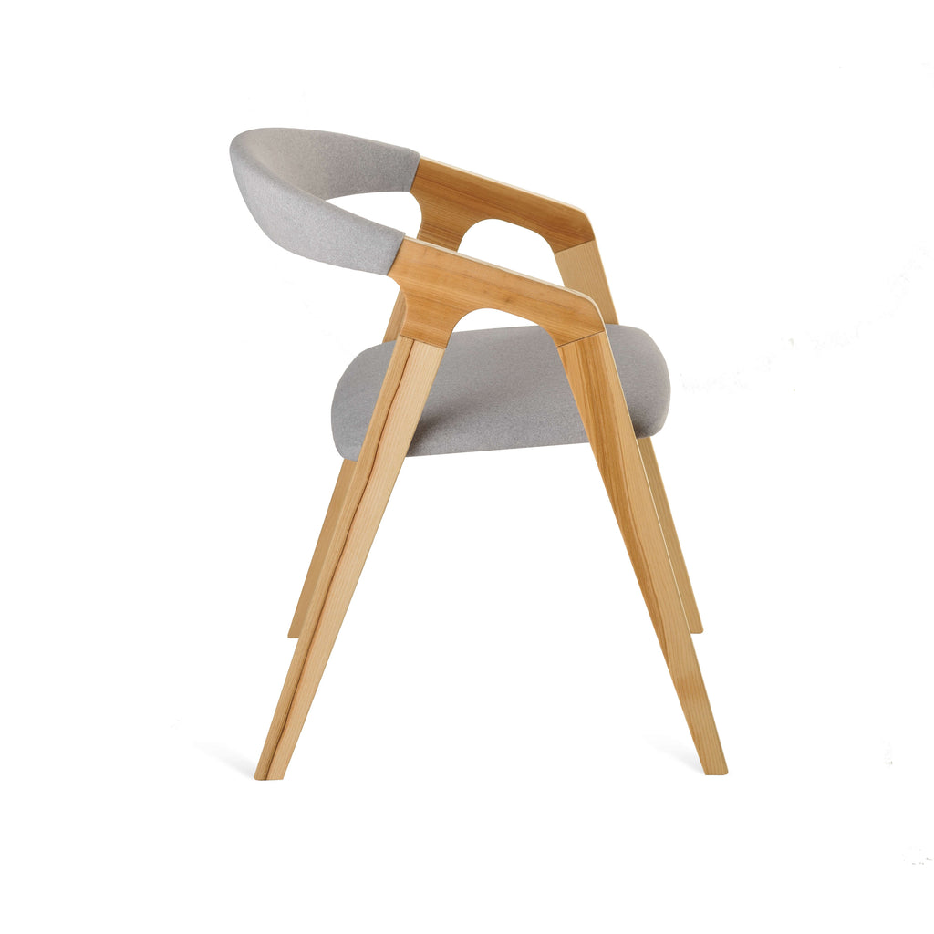 Side profile of Olive Ash Bridge Chair with grey fabric seat and wood legs